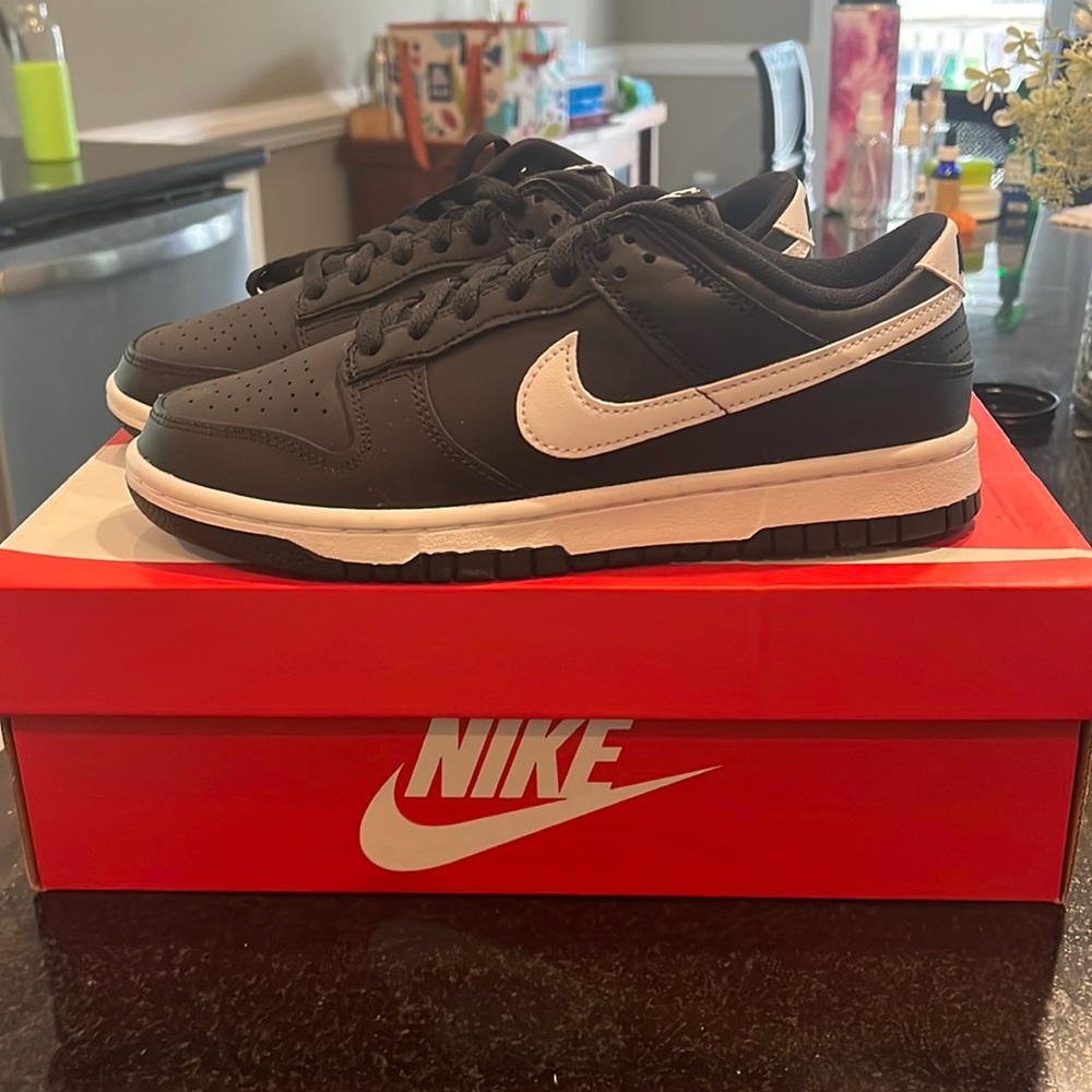 Brand new Nike dunk low black and white. With box. Men size 6.5 - women’s 8.